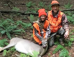 Juliann Lawson and her father Dan with her first deer